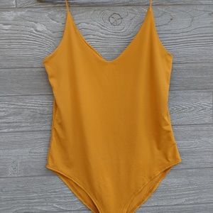 NWOT Gaze Mustard Colored Yellow Bodysuit